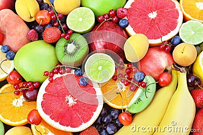 Fresh ripe sweet fruits: apple, orange, grapefruit, qiwi, banana, lime, peach, berries Stock Photo