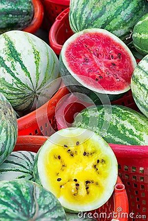 Yellow and red watermelon at a local market Stock Photo