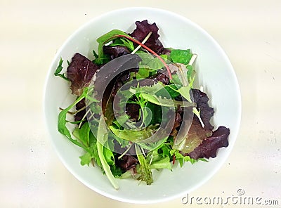 Fresh salad mixed in the bowl, clean food, healthy food Stock Photo