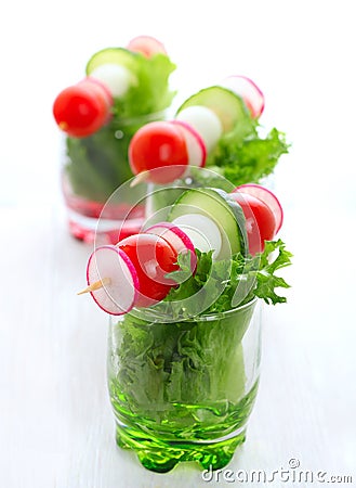 Fresh salad with tomato, cucumber and radish Stock Photo