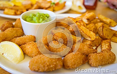 Fresh scampi and chips Stock Photo