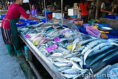 Fresh seafood on the counter at the fish market by the ocean Editorial Stock Photo