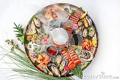 Fresh seafood plate with mussels, oysters, scallop and tuna Stock Photo