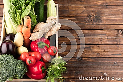 Fresh seasonal vegetables in wooden box Stock Photo