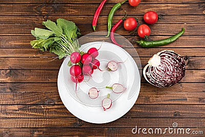 Fresh seasonal vegetables on wooden table top texture Stock Photo