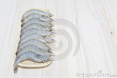 Fresh shrimp prepare for cook on wooden dish and wooden backgrou Stock Photo