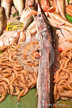 Fresh shrimps next to fish Stock Photo