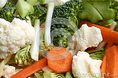 Fresh sliced colorful vegetables - broccoli, carrots, cauliflower. Stock Photo