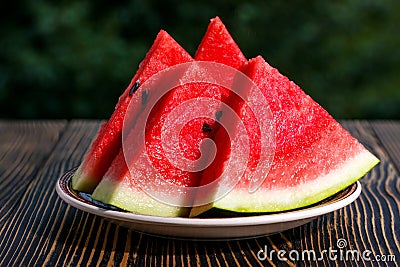Fresh sliced watermelon wooden background Stock Photo