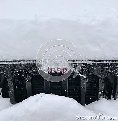 Fresh snow on black Jeep Editorial Stock Photo