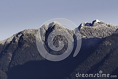 Fresh snow fall on north shore mountains in Vancouver, Canada Stock Photo