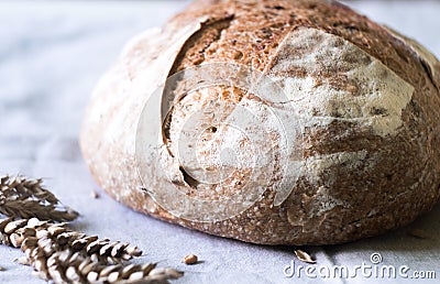 Fresh sourdough artisan bread on kitchen towel Stock Photo