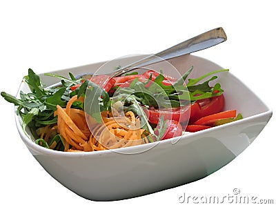 Fresh spring salad with tomatoes, rucola and carrots isolated on white Stock Photo
