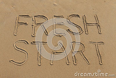 Fresh Start Written in the Sand Stock Photo