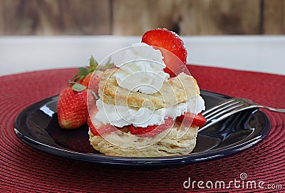 Fresh strawberry shortcake with homemade biscuits and garnished Stock Photo