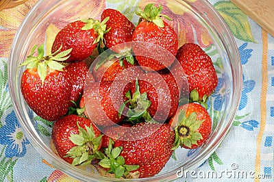 Fresh strawberry in a transparent salad bowl Stock Photo