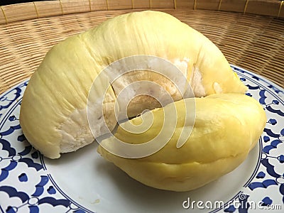 Fresh and sweet Durian on blue and white plase in bamboo basket Stock Photo
