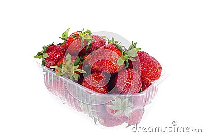 Fresh sweet red strawberries in plastic container. Stock Photo