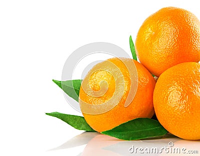 Fresh tangerine fruits with green leaves isolated Stock Photo