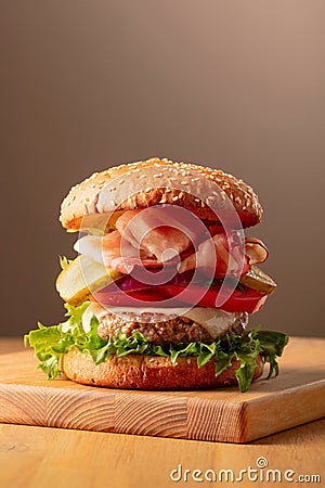 Fresh tasty burger on a beige background Stock Photo