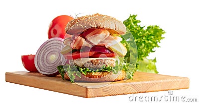 Fresh tasty burger on a wooden cutting board Stock Photo