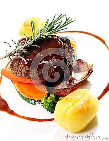 Fresh tasty meat with gourmet garnish Stock Photo
