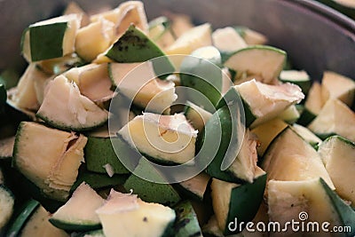 Fresh and Tasty Pieces Of Green Indian Mango Fruit Stock Photo
