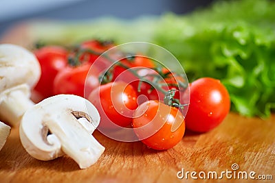Fresh and tasty tomatoes, salad, onion, champignon Stock Photo