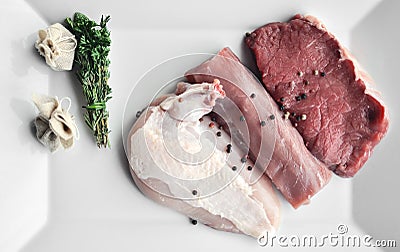 Fresh three types of meat on plate Stock Photo