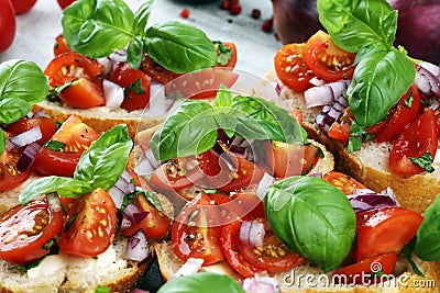 Fresh tomato bruschetta. italian food appetizer with basil on table Stock Photo
