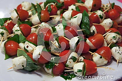 Fresh tomato & mozzarella balls with basil Stock Photo