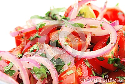 Fresh tomato salad inside transparent bowl Stock Photo