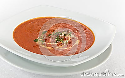 Fresh tomato soup with cream in a plate Stock Photo