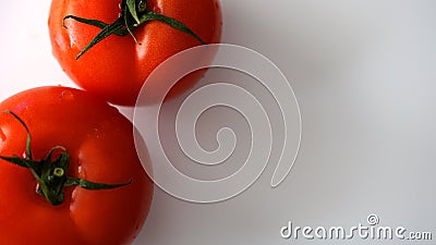 Fresh tomato on white Stock Photo