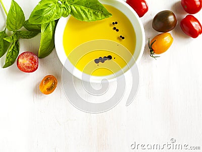 Fresh tomatoes, basil, olive oil with balsamic vinegar Stock Photo