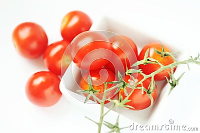 Fresh tomatoes in square bowl Stock Photo