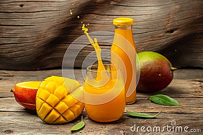 Fresh tropical fruit smoothie mango juice. Freeze motion splash drops of juice. place for text Stock Photo