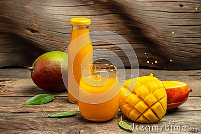 Fresh tropical fruit smoothie mango juice. Freeze motion splash drops of juice. place for text Stock Photo