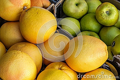 Fresh Tropical Grapefruit And Apples On A Market Sellers Stall Editorial Stock Photo