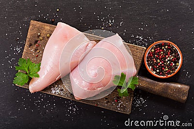 Fresh turkey meat on dark table Stock Photo