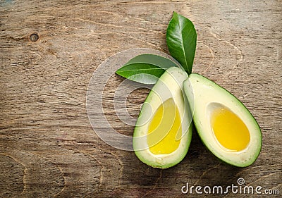 Fresh two halfs of avocado like a bowl for oil Stock Photo