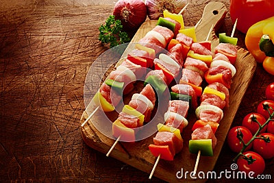 Fresh uncooked meat kebabs ready for grilling Stock Photo