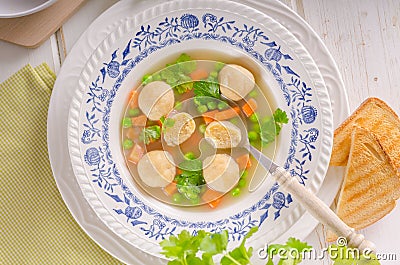 Fresh vegetable soup with chicken dumplings Stock Photo