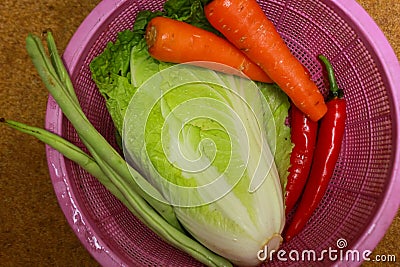 fresh vegetables in a basin Stock Photo