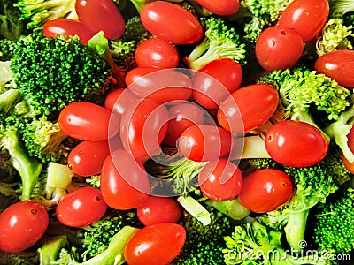 Fresh vegetables broccoli cocktail tomatoes veggies salad closeup close up Stock Photo