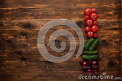 Fresh vegetables on a brown wooden background Stock Photo