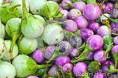 Fresh vegetables - eggplant purple and green market. Stock Photo