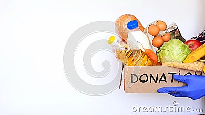 Fresh vegetables and fruits.Sharing food concept. Delivery of products. donation box. Volunteer collecting food. Coronavirus Stock Photo