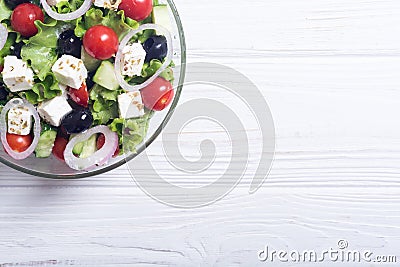 Fresh vegetables greek salad Healthy food on wooden background Stock Photo