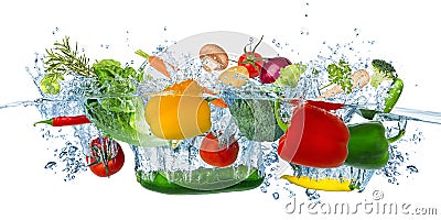 Fresh vegetables splashing into blue clear water splash healthy food diet freshness concept isolated white background Stock Photo